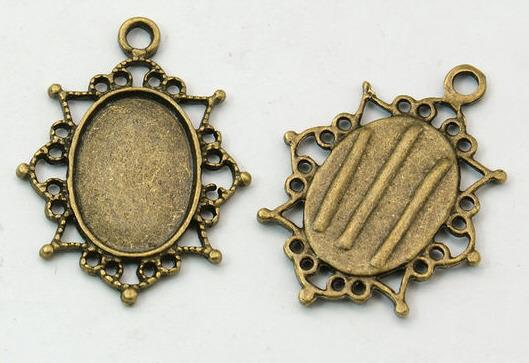 Medaljon antik bronza, 37X24 mm, oval