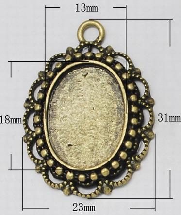 Medaljon antik bronza,32X25 mm, oval